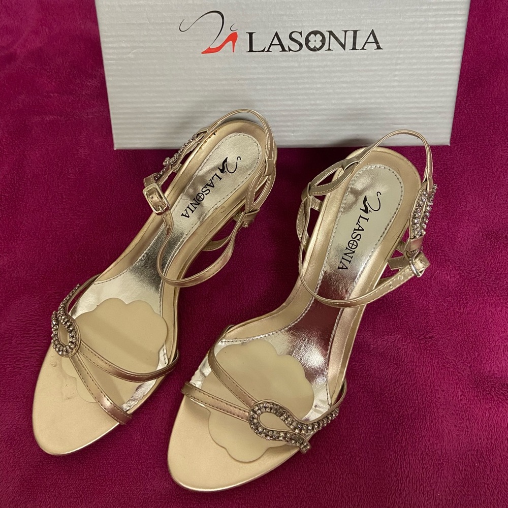 Lasonia heels. Worn for ceremony only. Champagne color. Size 8.5. 3” heel